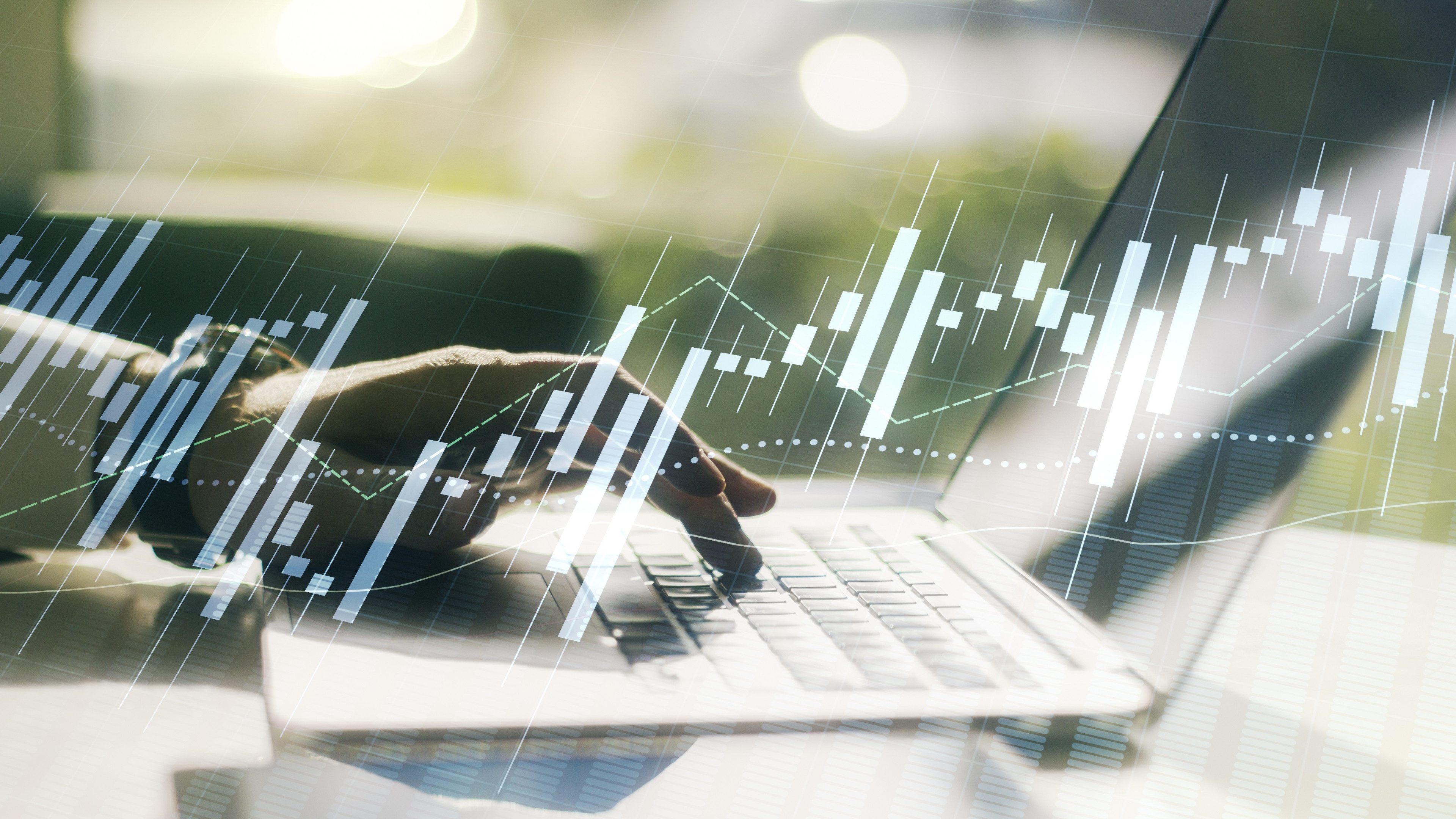 Multi exposure of abstract creative financial chart with hand typing on computer keyboard on background, research and analytics concept