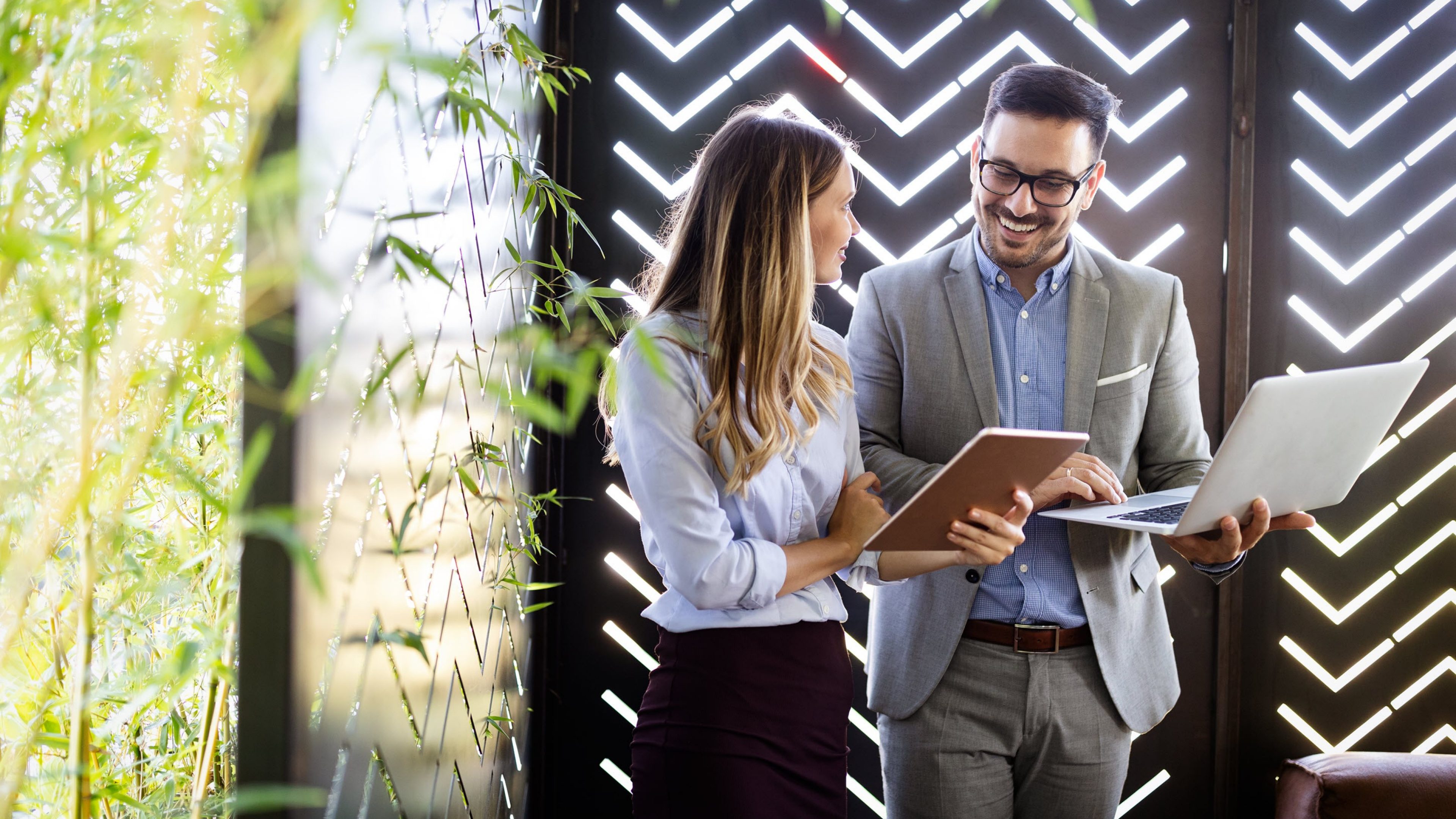 Two business colleagues at meeting in modern office interior